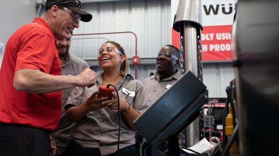 Group of auto tech students with their instructor