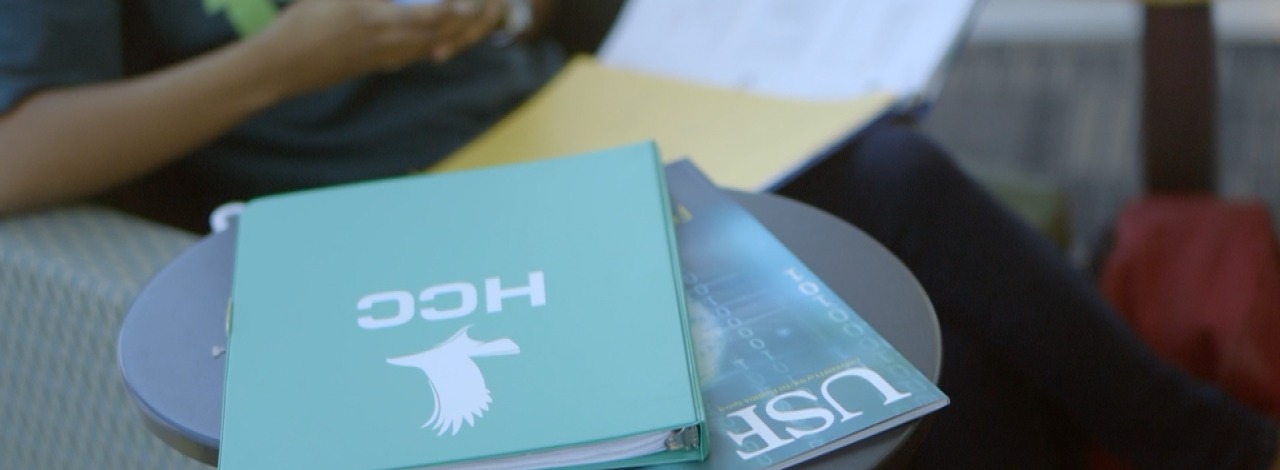 branded college promotional items sitting on table